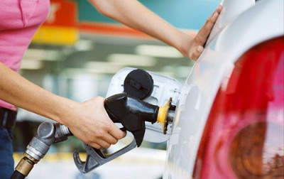 Woman Pumping Gas