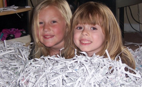 Girls Buried in Shredded Paper Girls Buried in Shredded Paper